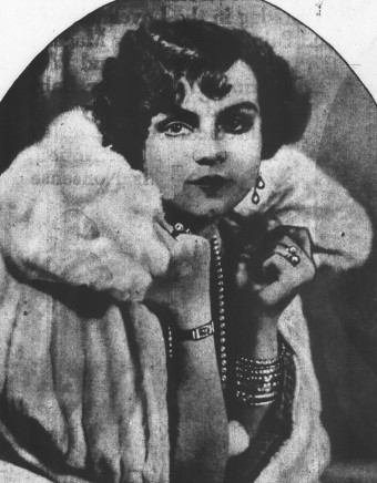 Photograph of Dot King with furs and jewelry